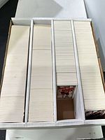 Four-row box filled with thousands of hockey cards