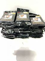 Stack of sealed black foil Score baseball card packs