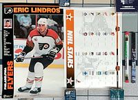 Lindros and NHL Stars posters side by side with packaged posters at right