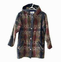 Front view of patterned wool hooded jacket on hanger