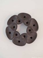 Top view showing eight-lobe ring and candle holes