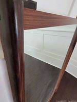 close-up of rosewood frame corner