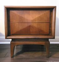 Front view showing diamond front drawers and frame