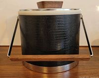 Front view showing texture, handle, wood grip and base trim