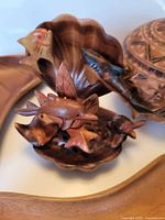 Overall lot showing fish sculpture, lidded jar, part of two trays