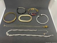 All seven jewellery items laid out for overview