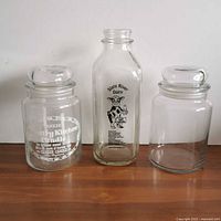 Front view of three glass containers