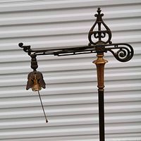 Bridge arm and finial detail, showing decorative metalwork