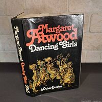 Front view of book with dust jacket showing title and artwork