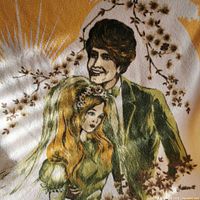 Close-up of bride and groom illustration on towel