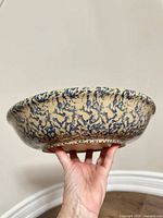 Side profile showing spongeware exterior pattern of bowl