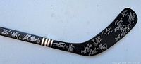 Close view of blade and lower shaft showing multiple silver signatures