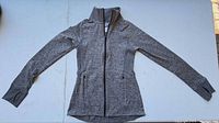 Full view of jacket laid flat to show style, color and features