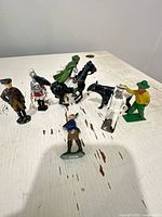 Group shot of all lead figurines on tabletop
