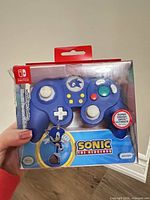 Front view of boxed Sonic The Hedgehog Wired Fight Pad Pro controller
