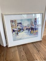 Frontal view of framed watercolour painting showing full artwork and frame