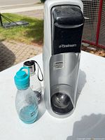 Front view of SodaStream machine with two bottles