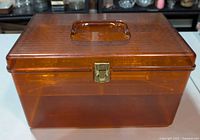 Closed amber storage box front view