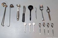 Full layout showing all 15 kitchen utensils and flatware pieces