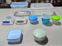 Nine assorted Sistema containers laid out for overview