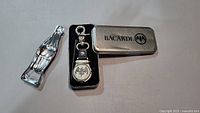 Pocket watch keychain, tin box, bottle opener overview