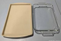 Glass dish and ceramic stone side by side, showing size and materials