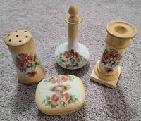 All four porcelain pieces grouped