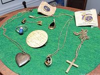 All jewellery pieces displayed on green felt for overview