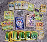 All cards, deck box and damage counters laid out