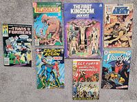All seven comic books laid out, full cover view