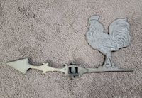Full weathervane showing rooster and arrow