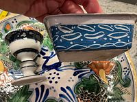 Overall view showing bowl interior design, cup and square dish