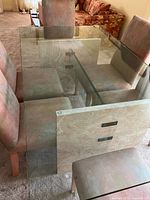 Top view showing rectangular tempered glass surface and marble bases