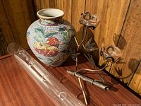 All three items group shot: ceramic vase, glass flower tube, metal candle holder