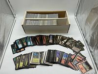 Box of cards and loose spread showing quantity and variety