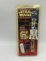 Front of sealed blister pack showing Star Wars Episode I R2-D2 wrist watch and accessory