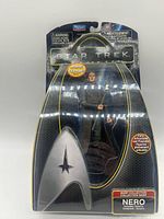 Front of sealed Nero action figure package