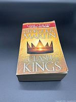 Front view of the paperback showing title, author and cover artwork