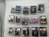 Overview of all stacks of baseball cards in cases