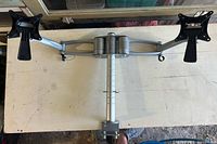 Overview of full dual monitor desk mount showing pole, clamp, arms, VESA plates