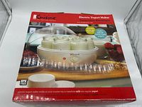 Front of product box showing Euro Cuisine YM80 yogurt maker and jars