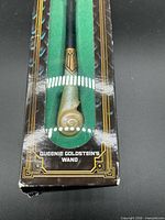 Front of boxed Queenie Goldstein wand showing handle and labeling
