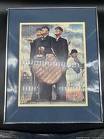 Front view of framed Norman Rockwell print with mat and frame visible