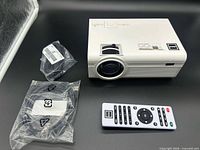 Projector, remote, power and HDMI cables
