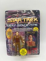 Front of sealed Odo action figure blister card showing figure, accessories, and branding
