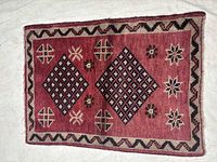 Entire rug front view showing full design and borders