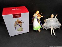 Both ornaments and Hallmark box front view