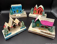 Group shot of all four vintage Putz houses