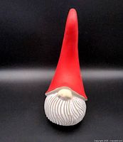 Front view of Abbott stone-feel Christmas gnome with red hat and white beard