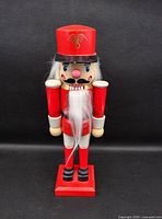 Front view of wooden soldier nutcracker showing paint colors and design